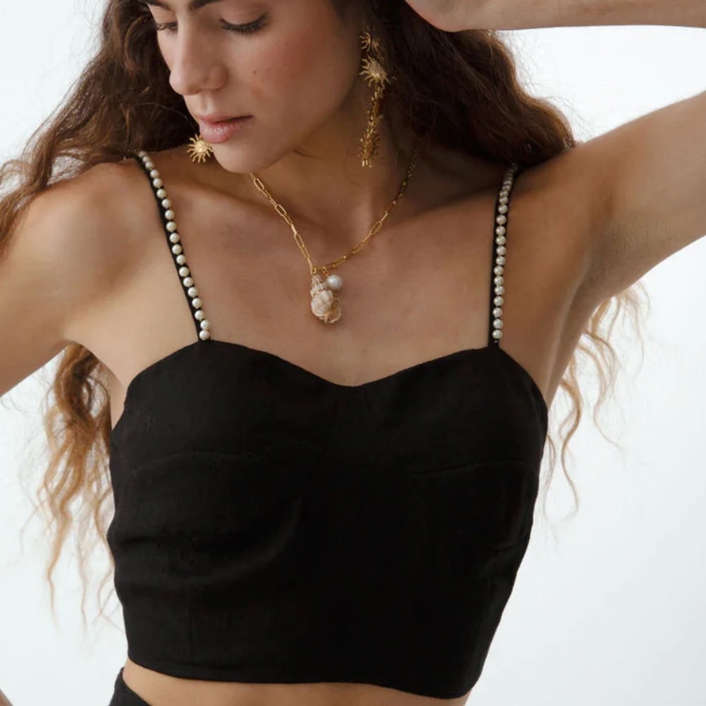 Carolina Benoit black top with beautiful pearl details. Size S